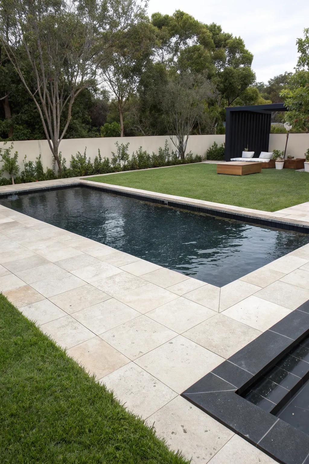 A monochrome pool design offers a clean and dramatic look.