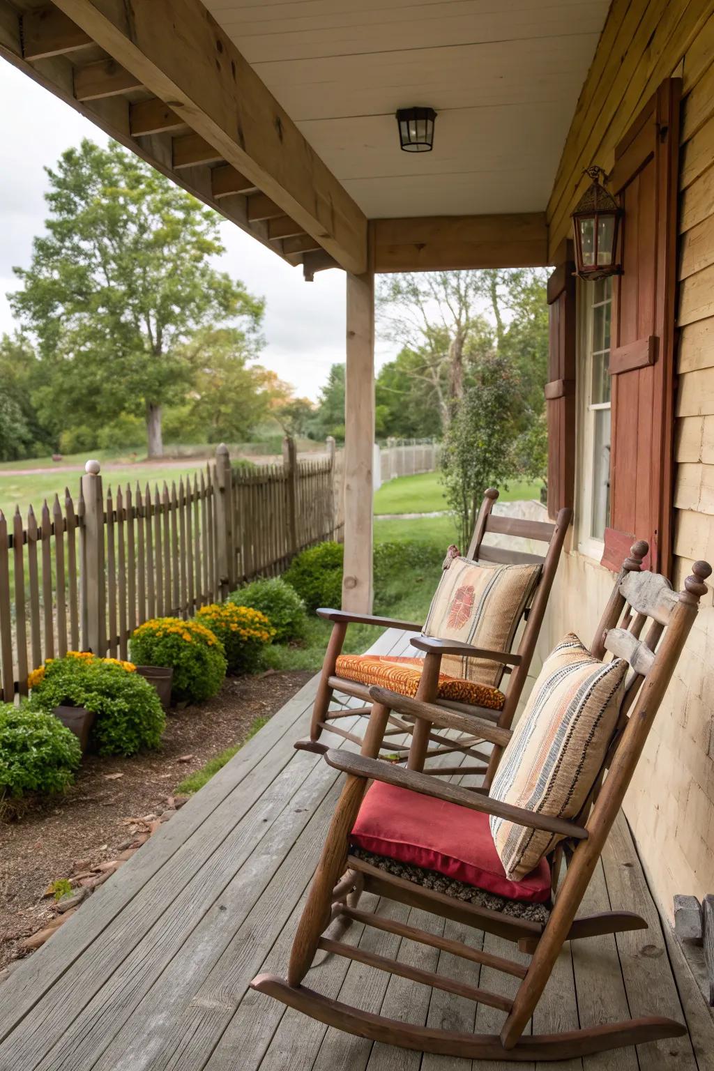 Classic wooden rocking chairs add timeless charm to your farmhouse porch.
