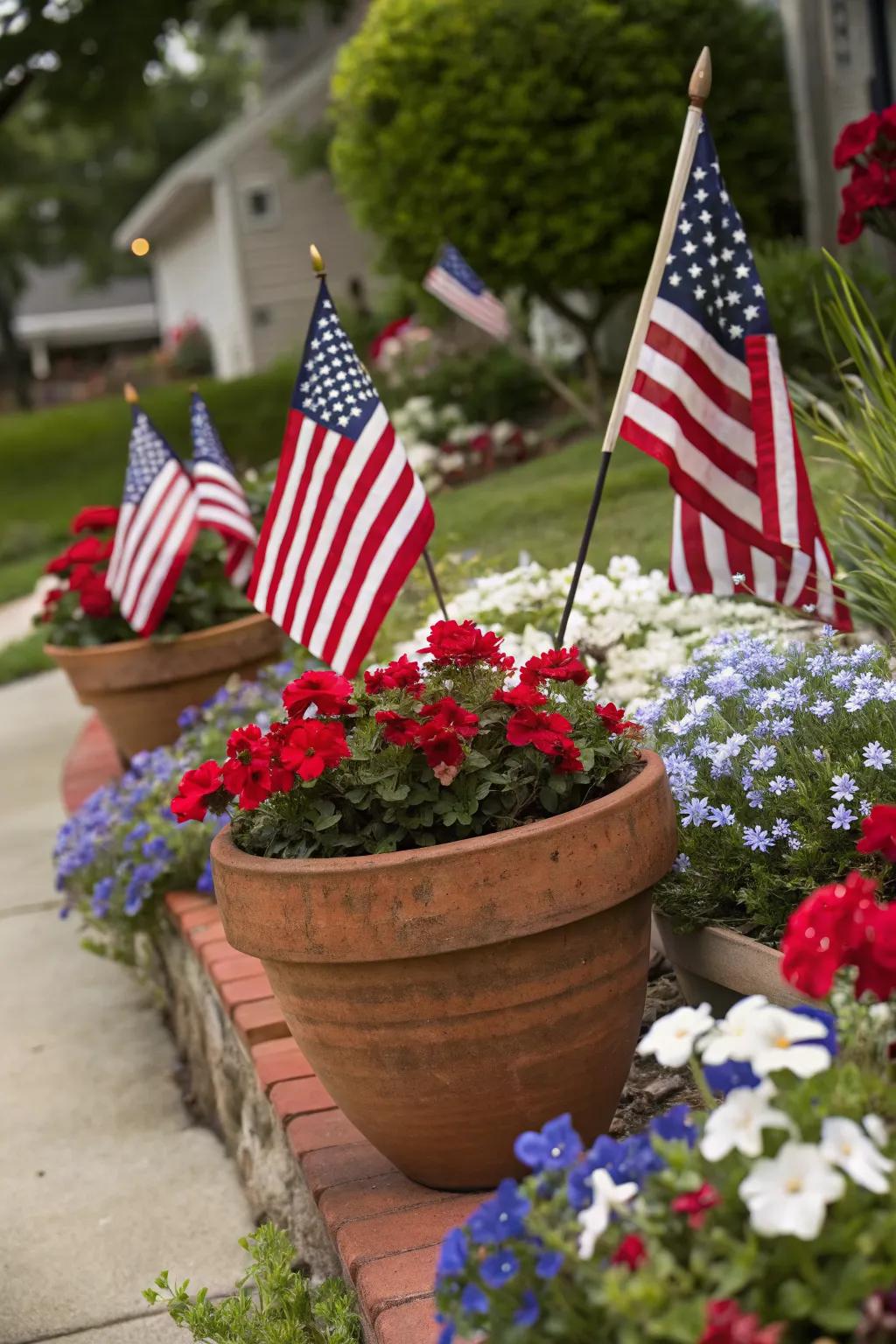 Flower pots adorned with American flags for a patriotic touch.