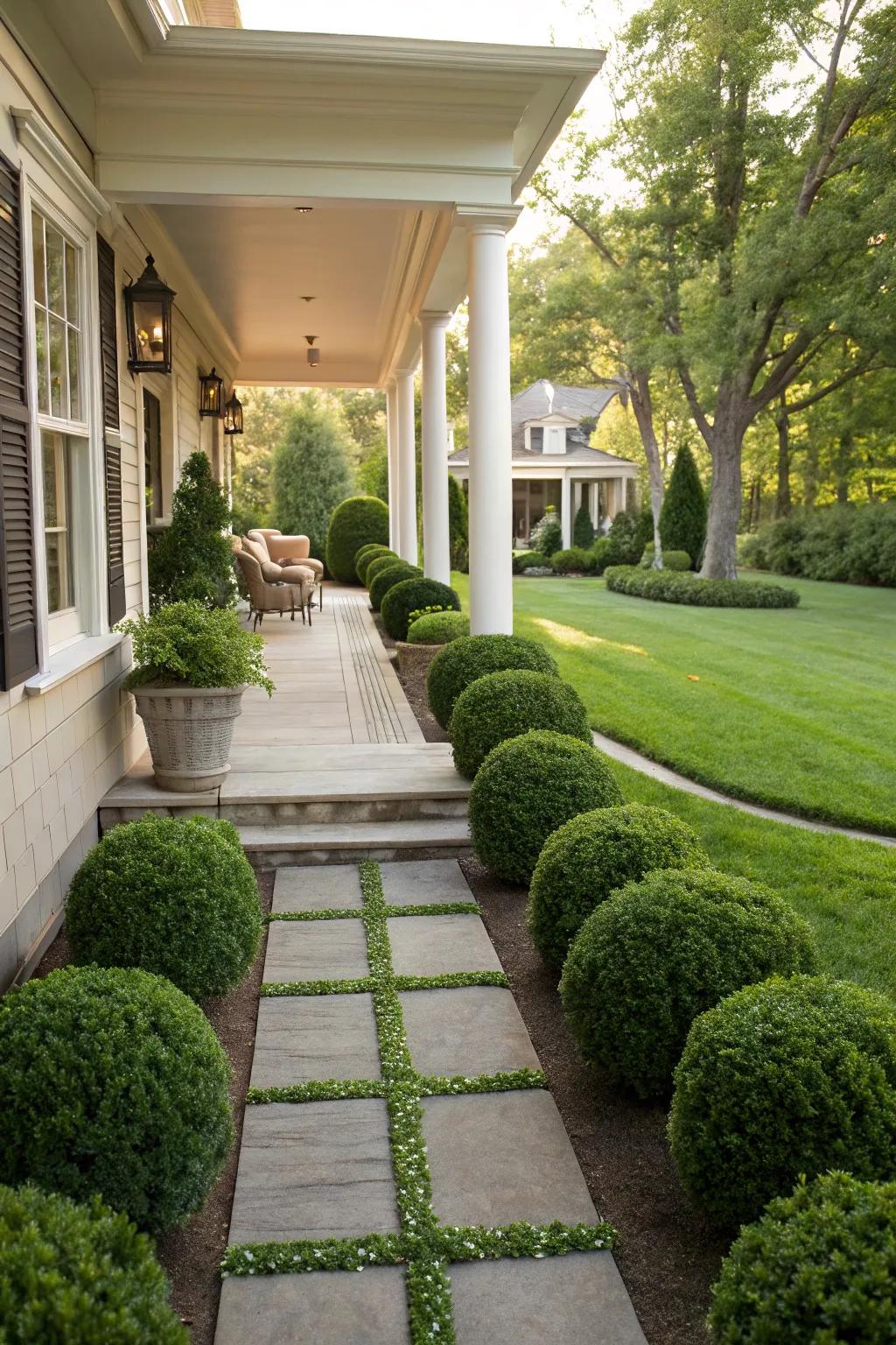 Create a grand entrance with formal pathways lined with boxwoods.