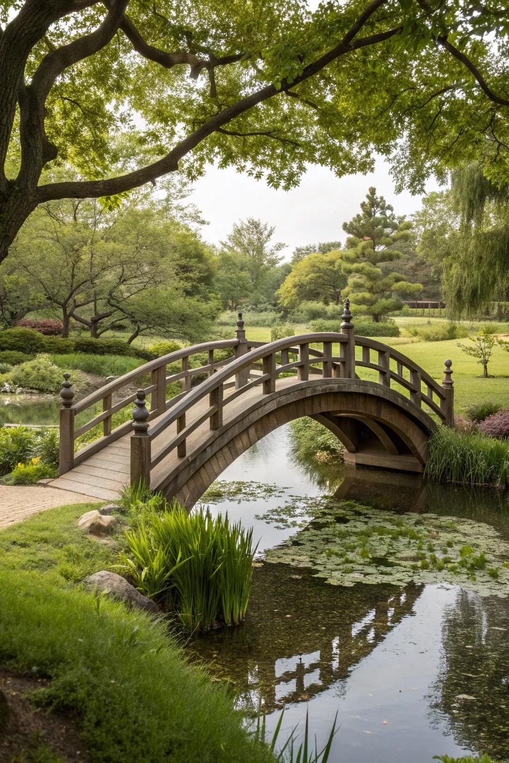 A timeless wooden arched bridge enhancing the beauty of a garden.