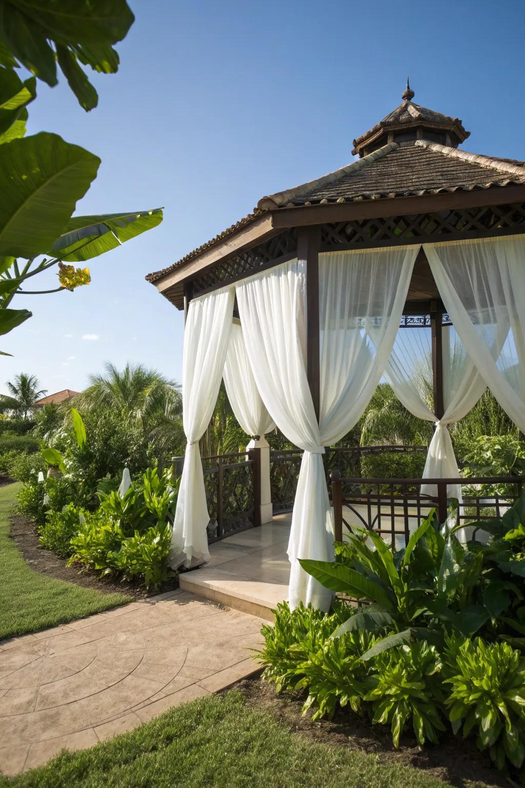 White drapes bring a resort-like elegance to your outdoor space.