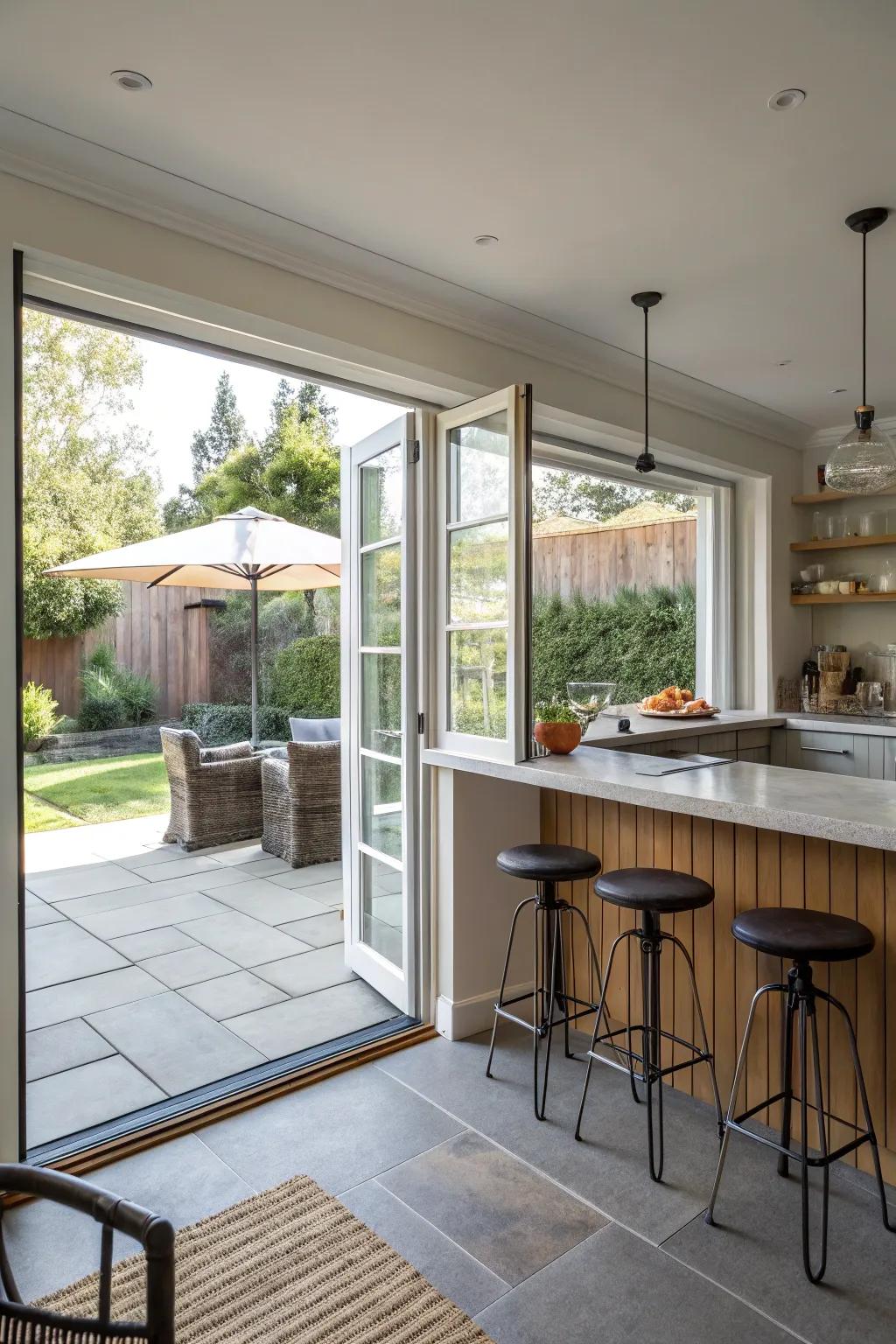 Accordion windows create a seamless flow between indoor and outdoor spaces.