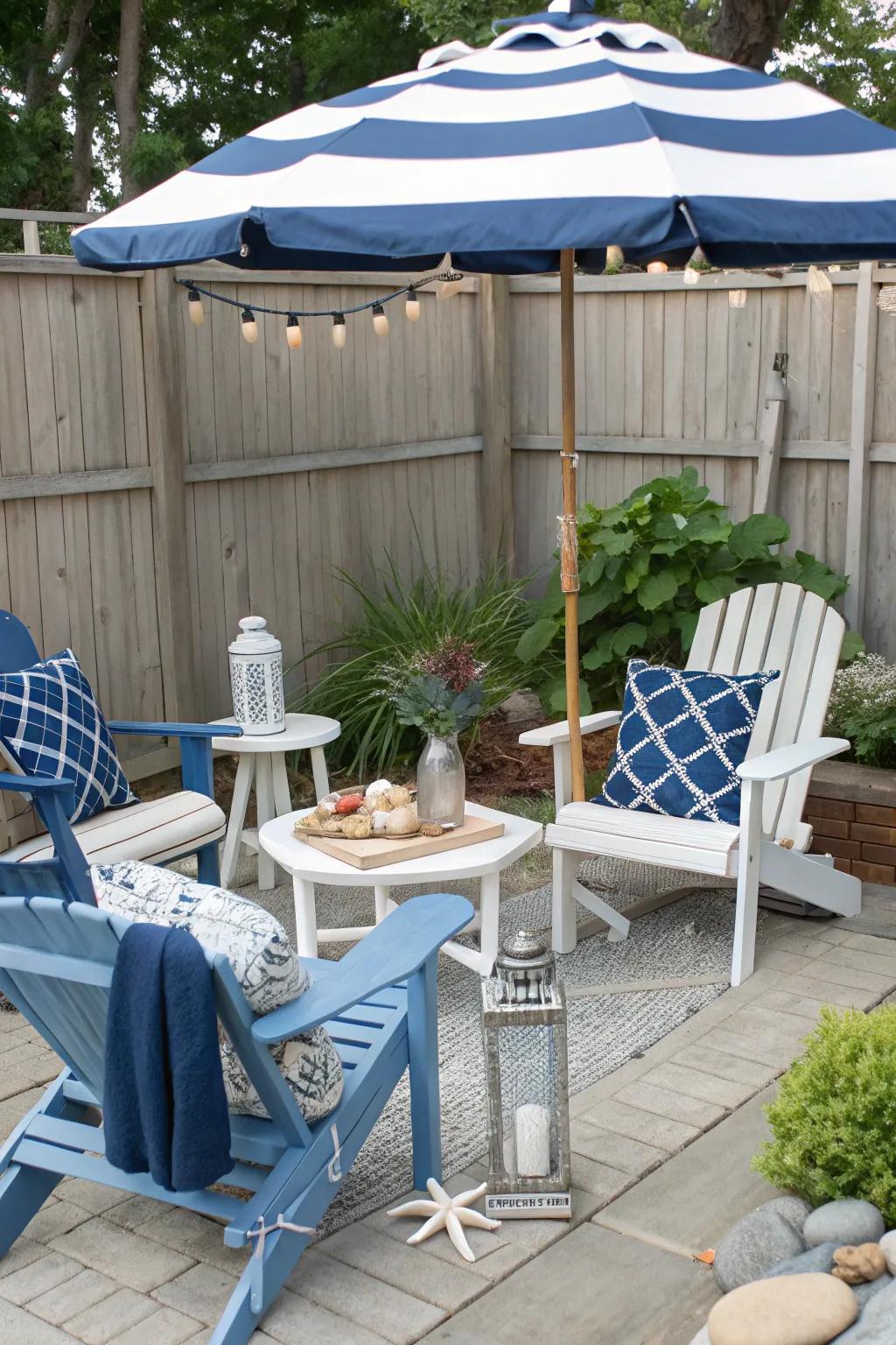 A patio styled with blue and white furniture, evoking a coastal and serene atmosphere.