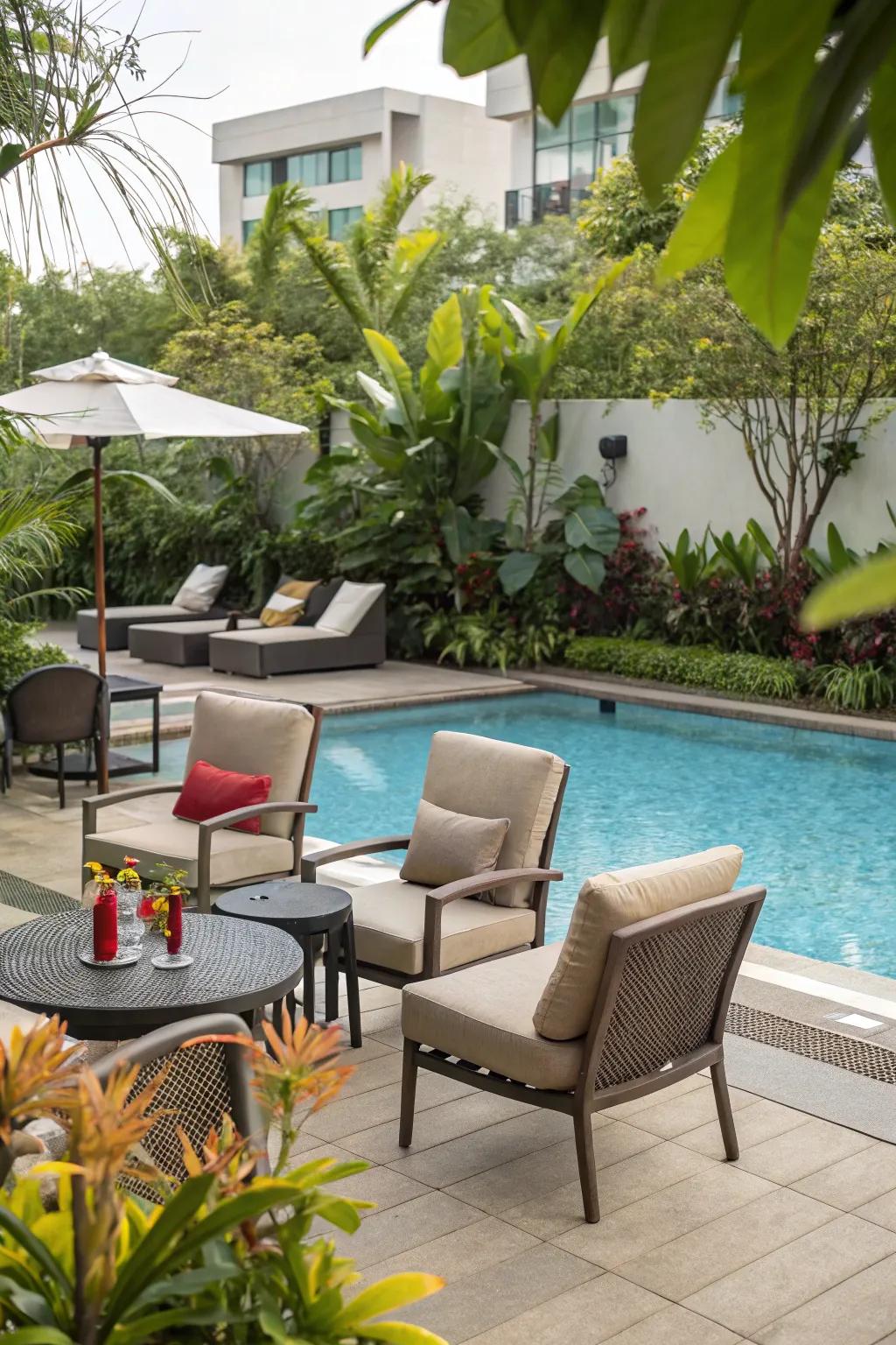 A cozy lounge area with comfortable seating by the pool.