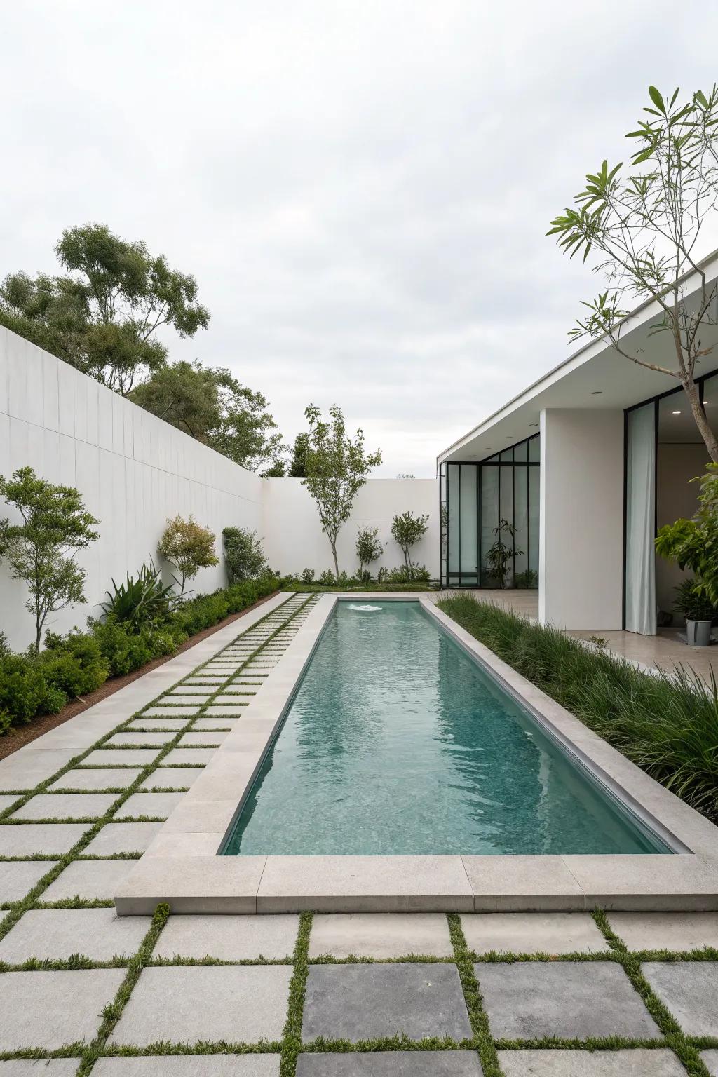 A sleek and minimalist pool design for a contemporary backyard.
