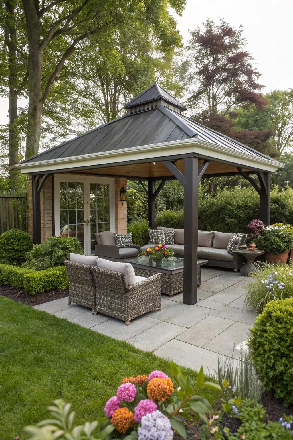 A charming stand alone patio with an elegant gabled roof.