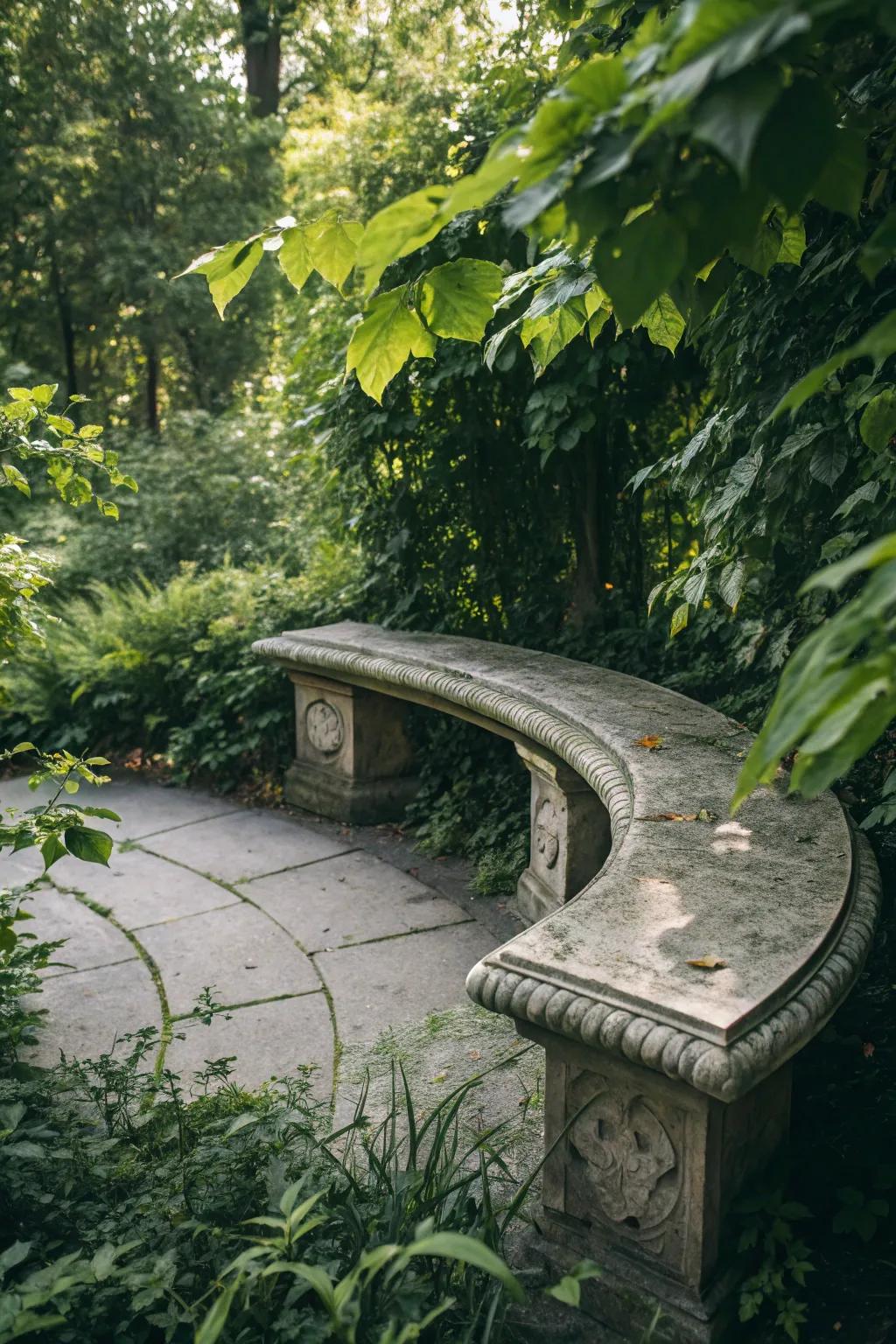 A gracefully curved stone bench that complements the garden's natural flow.
