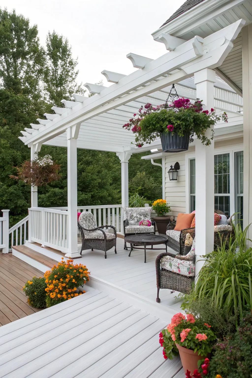 A white pergola adds a touch of elegance and shade.