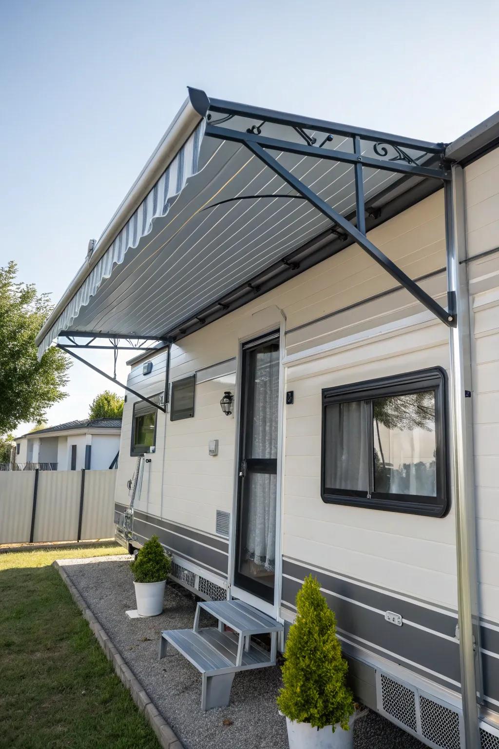 A classic metal awning providing shade and style to a mobile home window.