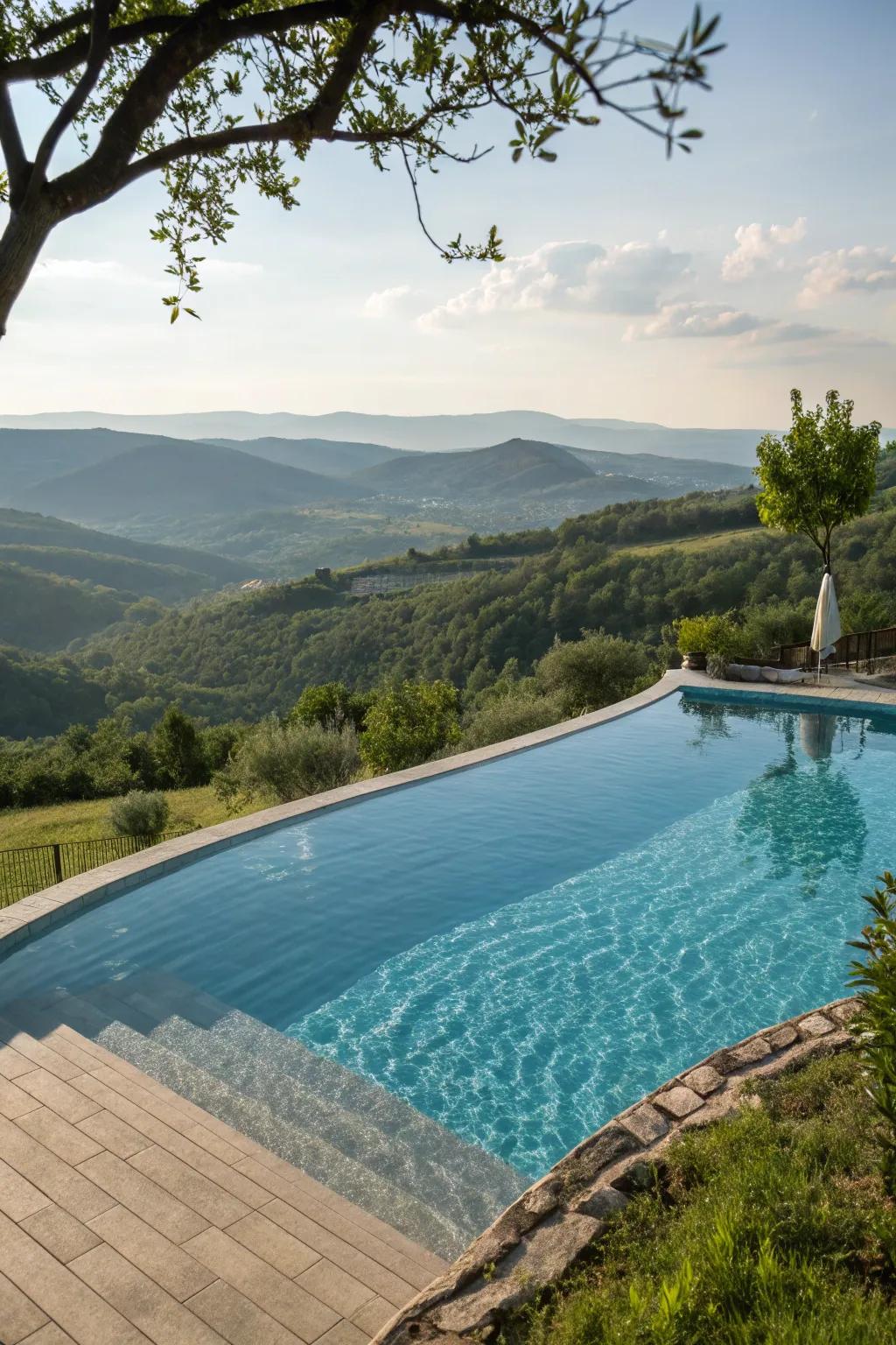 A luxurious 16x32 inground pool with an infinity edge effect.