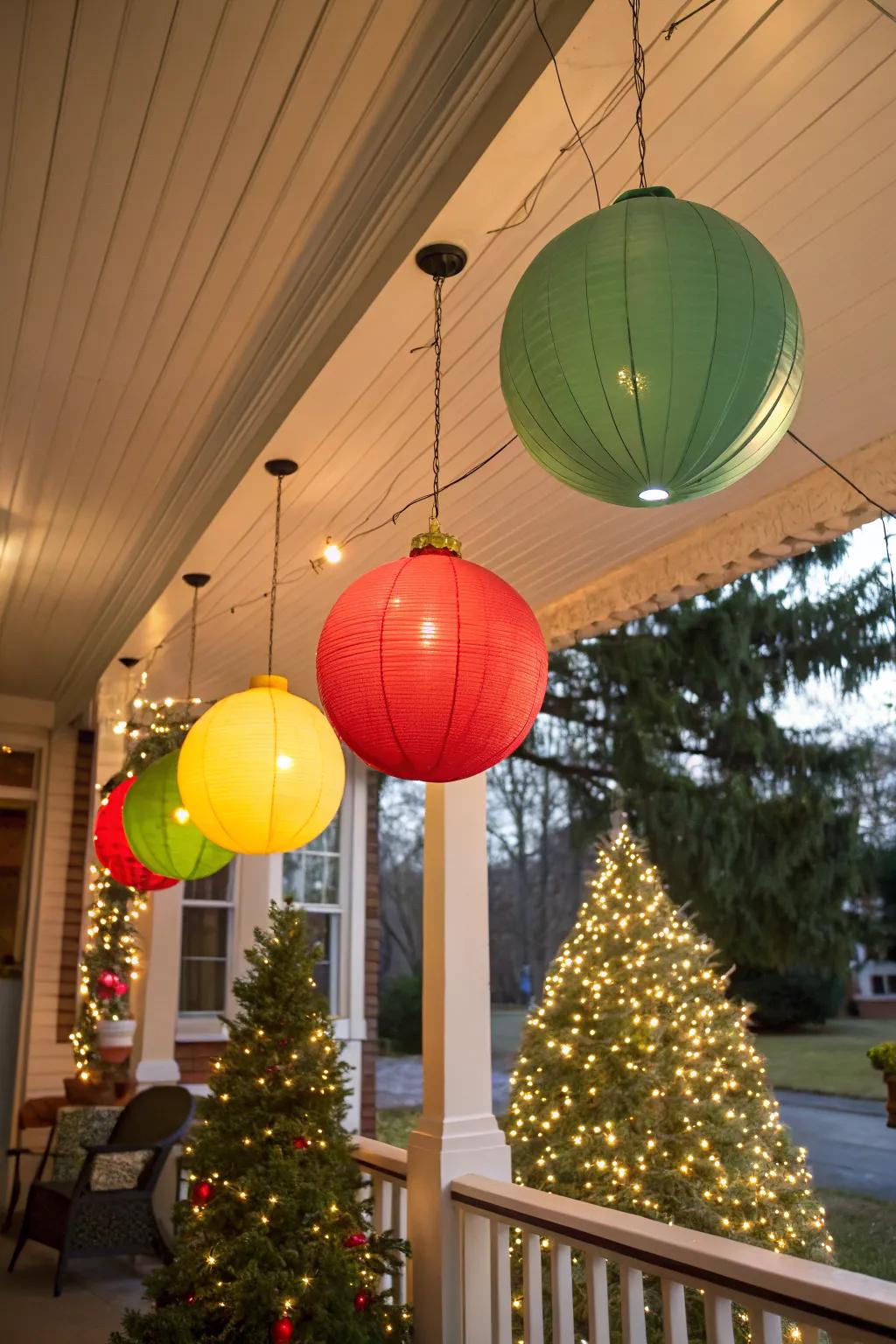Oversized ornaments add a whimsical touch to your porch decor.