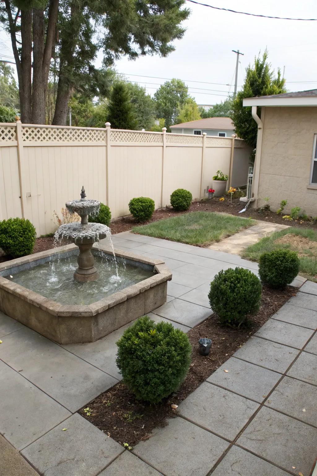 A mini water feature adds a soothing element to your patio.