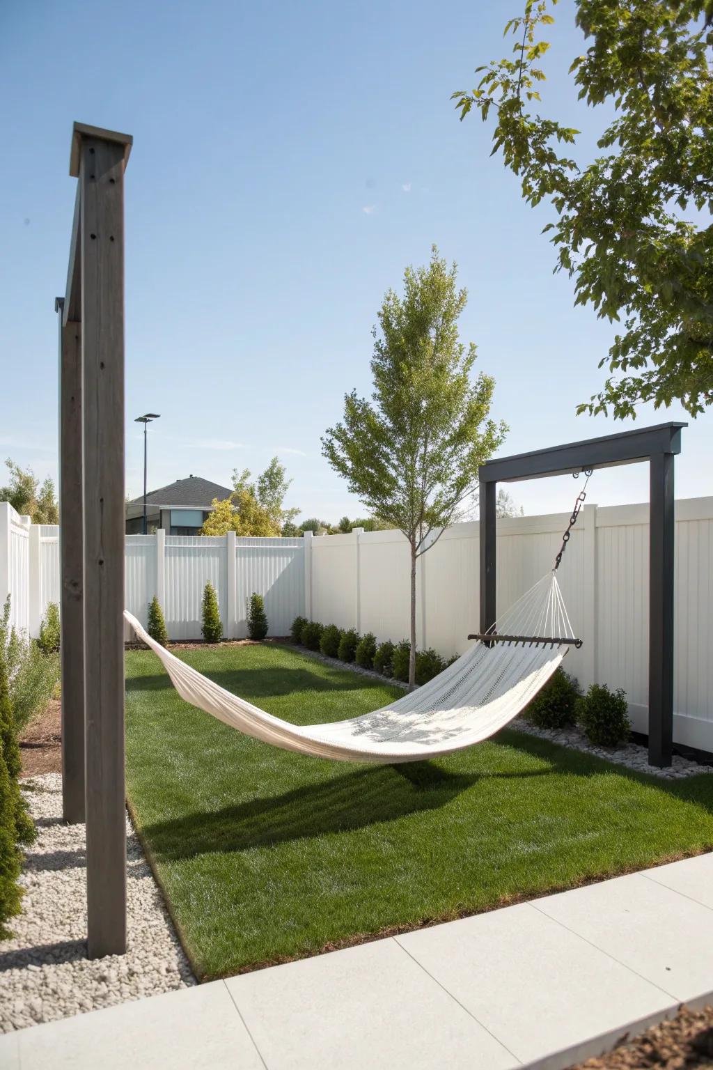 A minimalist hammock setup creates a sleek and stylish outdoor retreat.