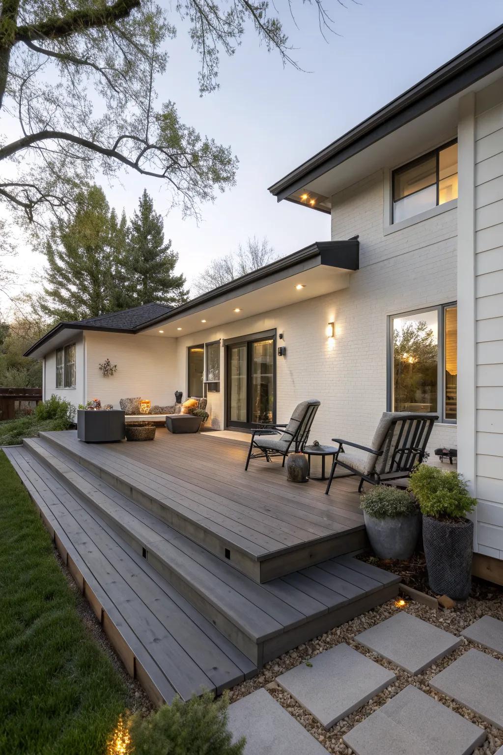 A modern raised ranch entrance with a stylish floating deck.