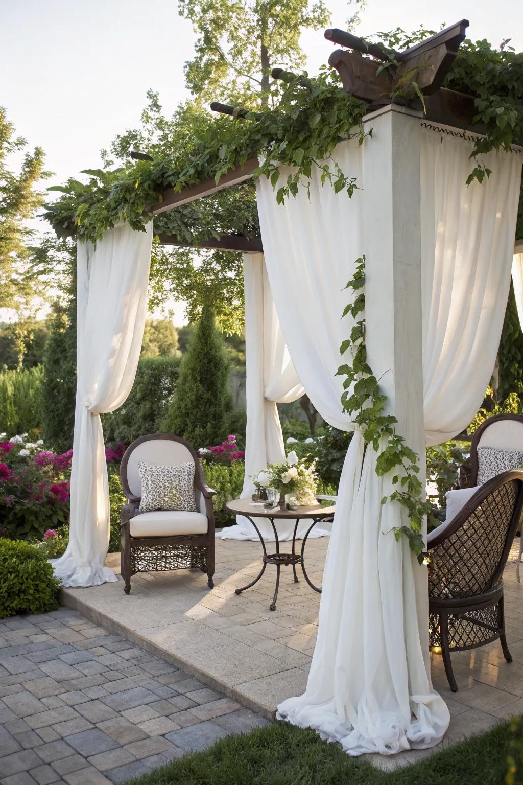 Curtains add elegance and privacy to a corner pergola.