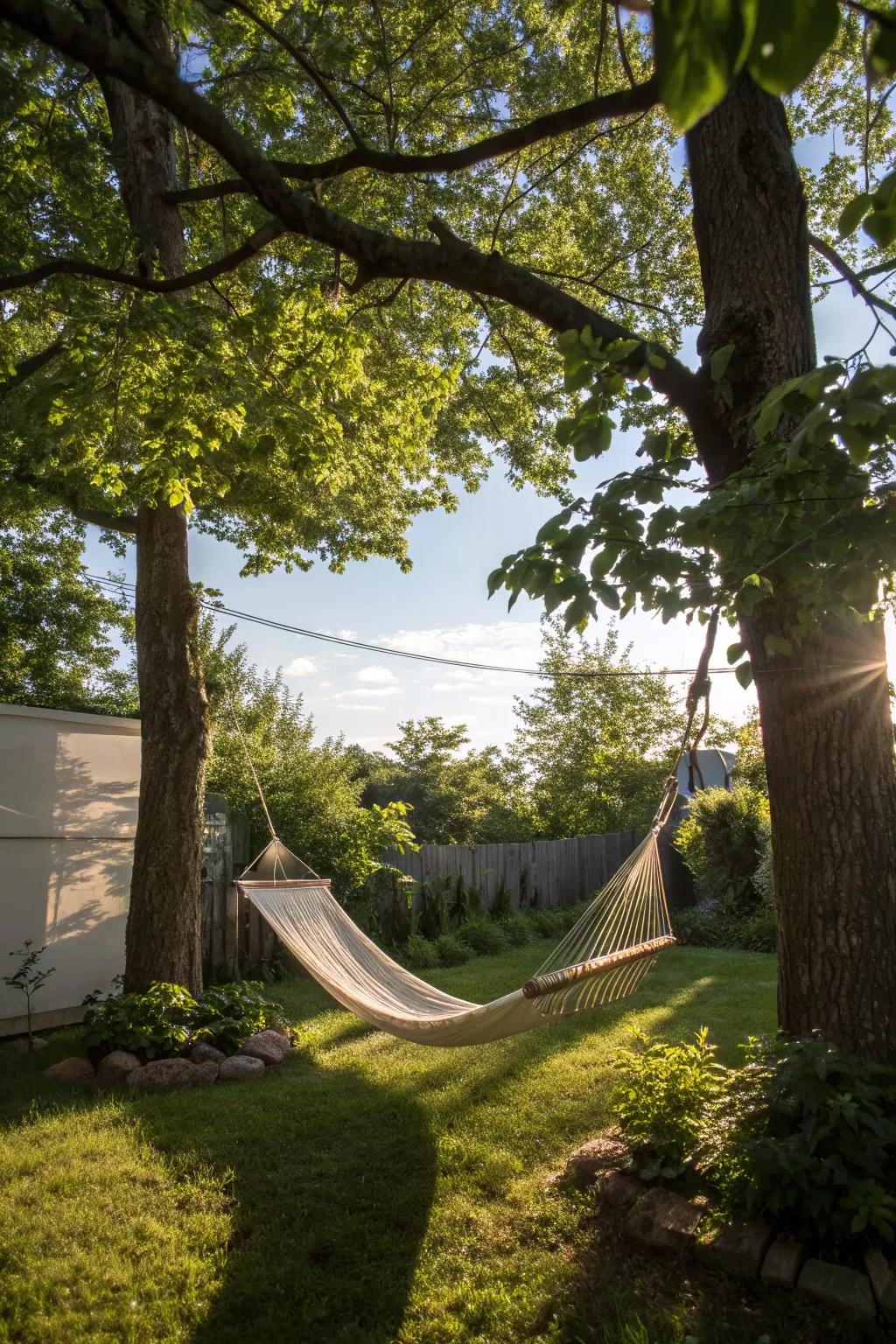A hammock inviting relaxation in a peaceful backyard setting.