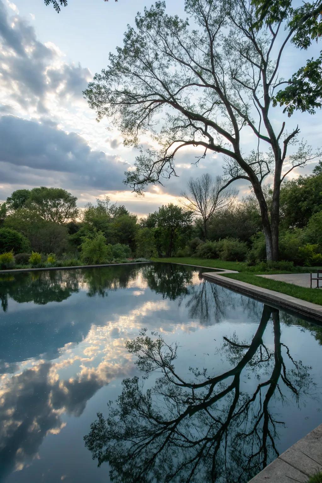 A mirror pond beautifully reflects the sky and surroundings.