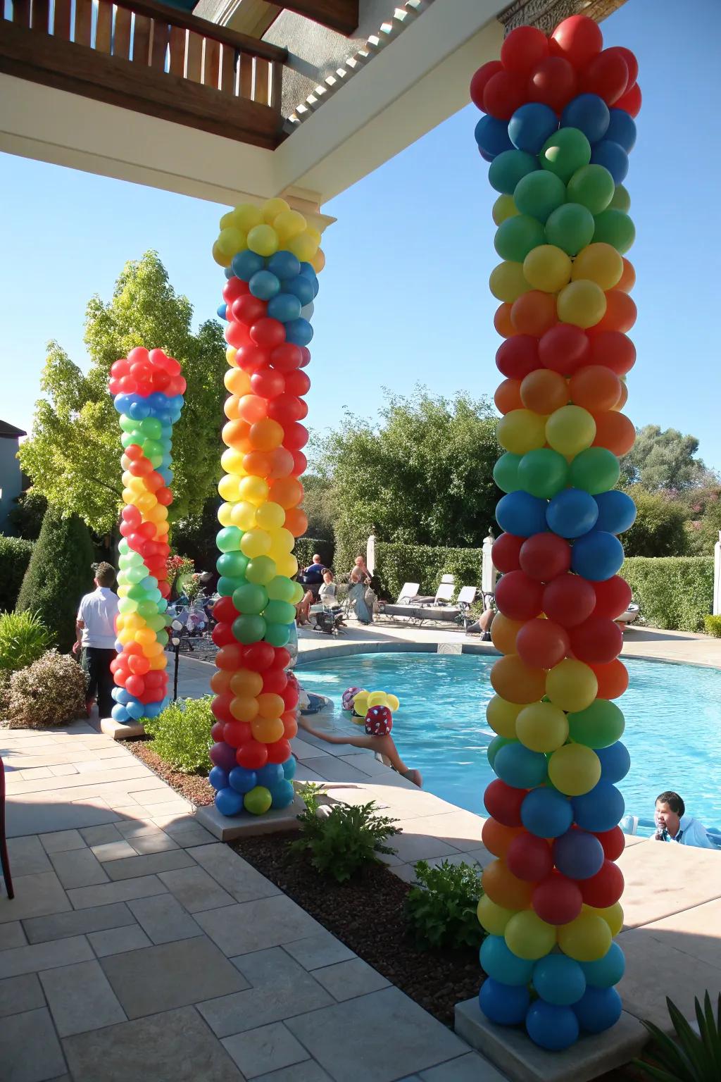 Balloon columns offer a grand entrance to your poolside event.