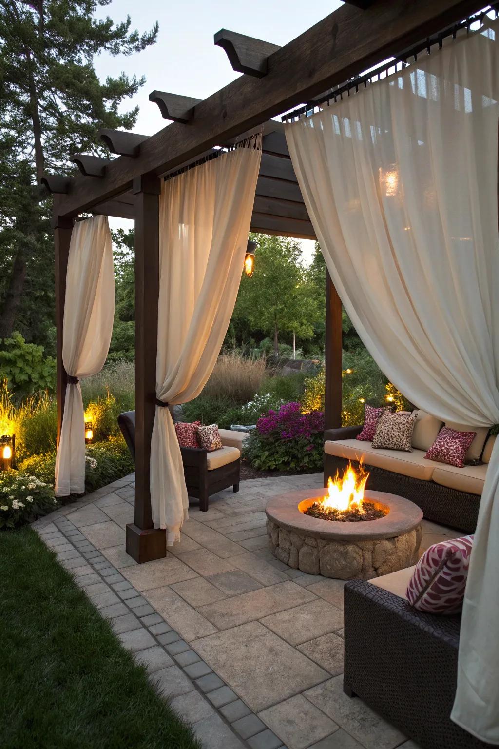 Curtains add privacy and style to the pergola.