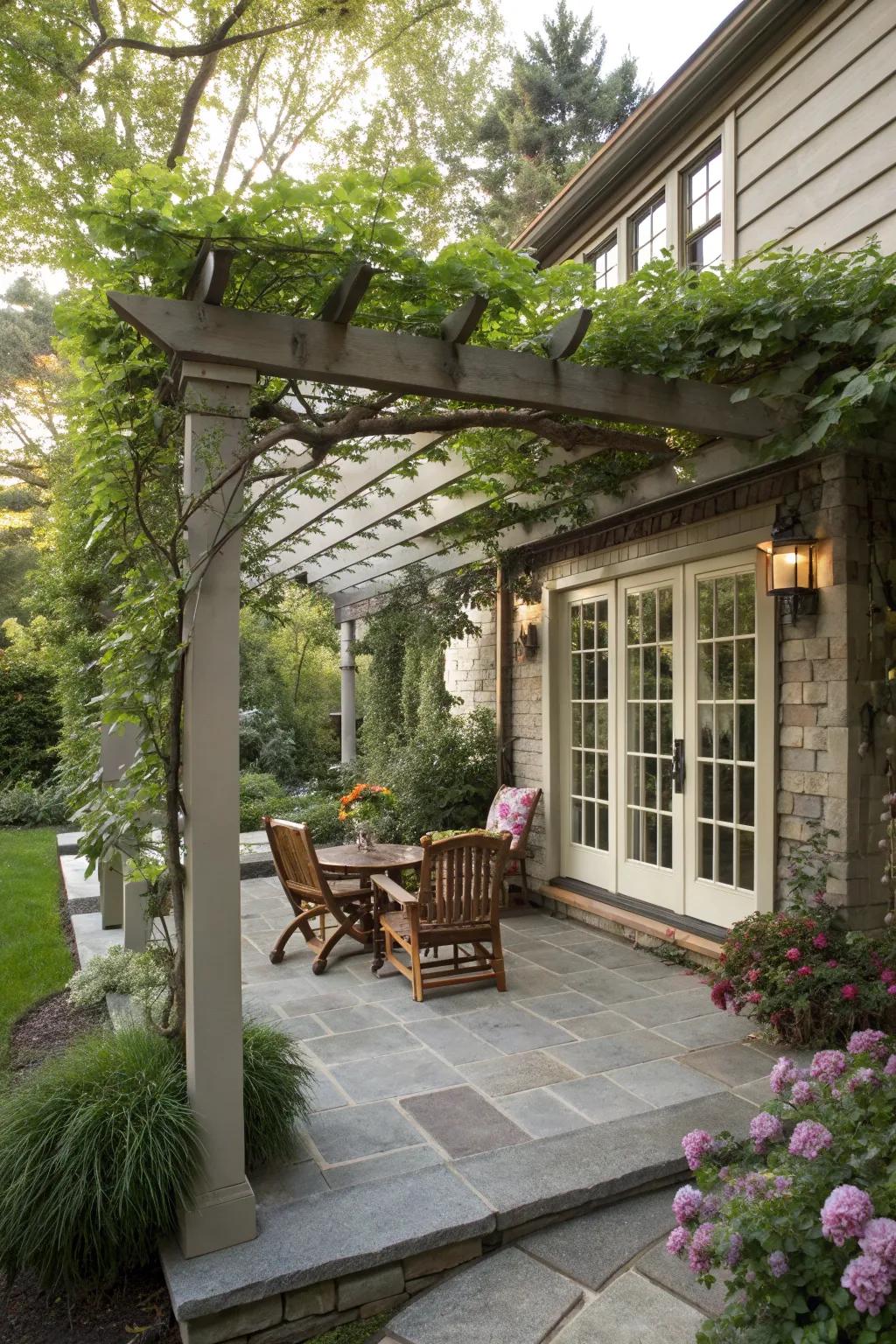 A pergola adds shade and elegance to the patio.
