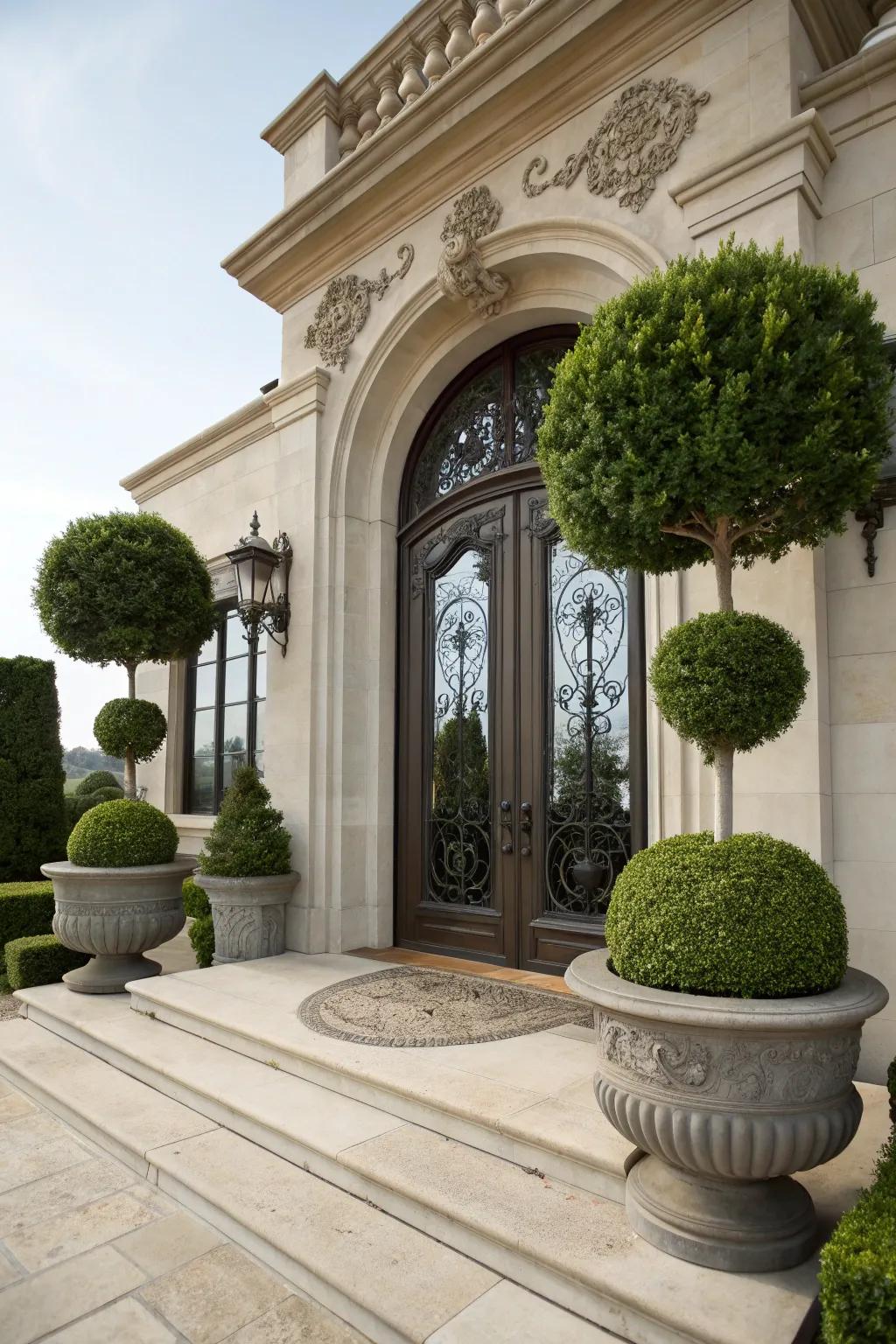 Topiary trees add height and a grand entrance statement.