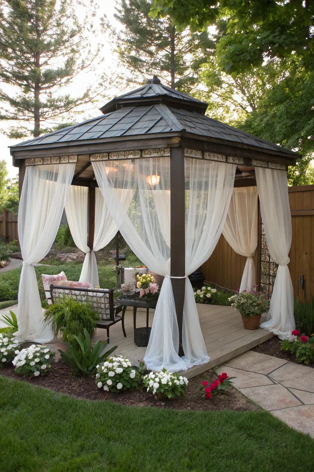 Create a private oasis with a gazebo adorned with flowing curtains.