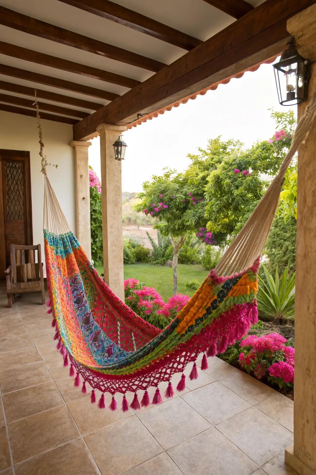 A colorful Mexican hammock hanging on a patio, inviting relaxation.