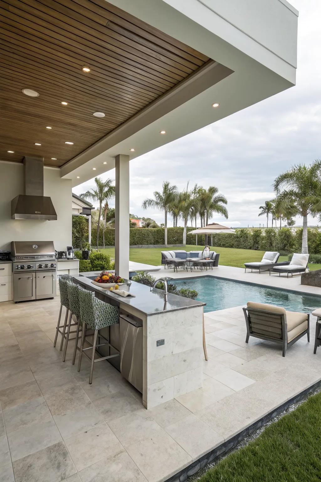 An outdoor kitchen that transforms a pool patio into an entertainer's delight.