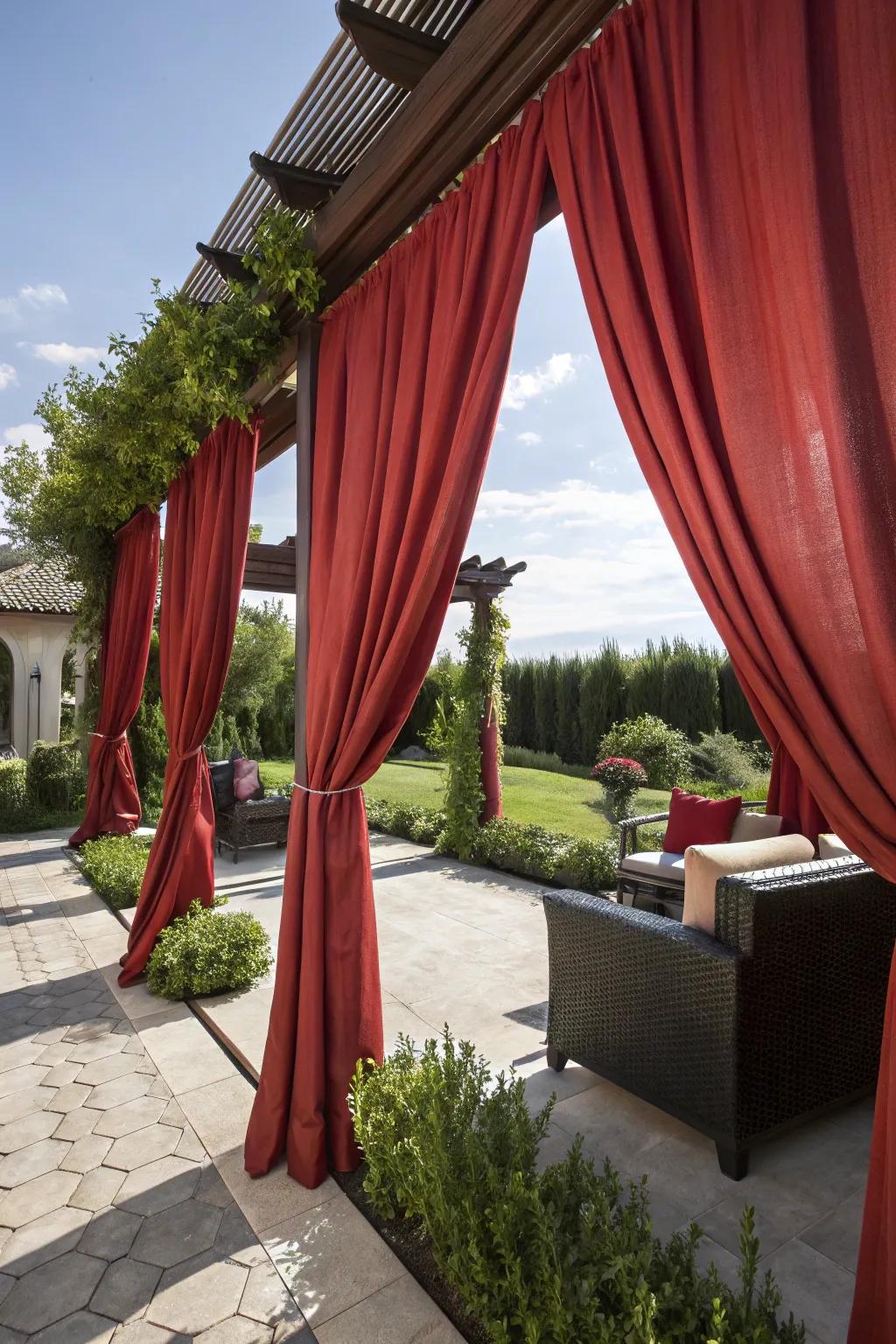 Add privacy and style with luxurious red outdoor curtains.