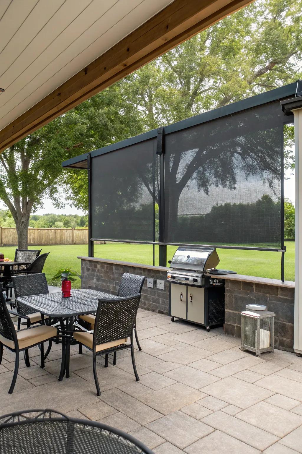 Roll-down screens shield your BBQ space from the elements.