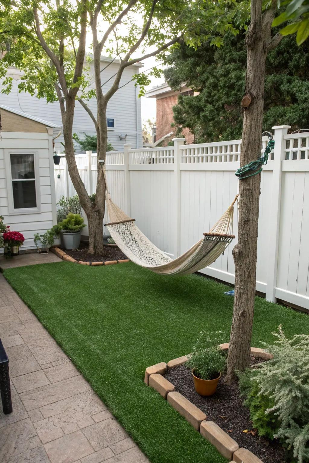 A hammock on turf provides the perfect relaxation spot.