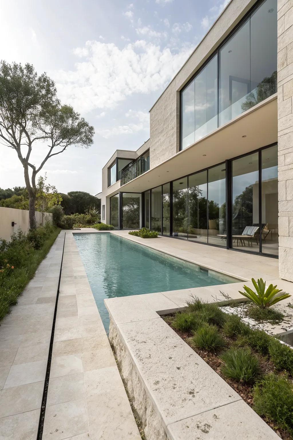 Limestone coping adds subtle sophistication.