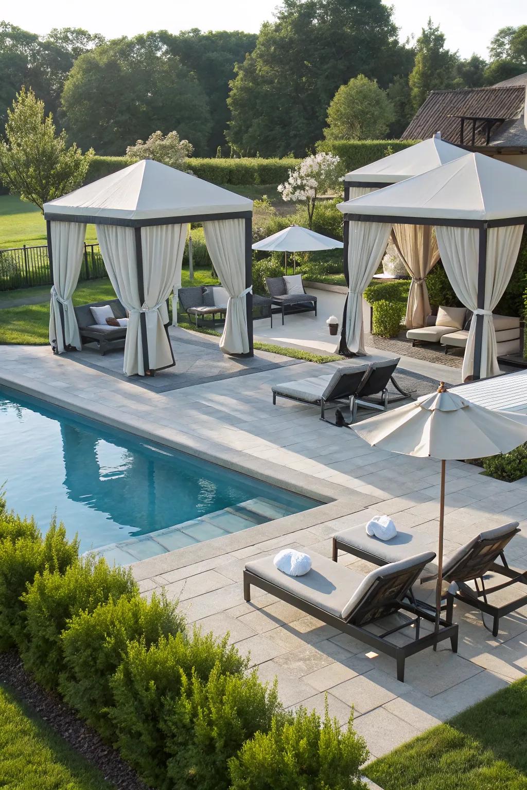 Luxurious poolside cabanas offering shade and style.