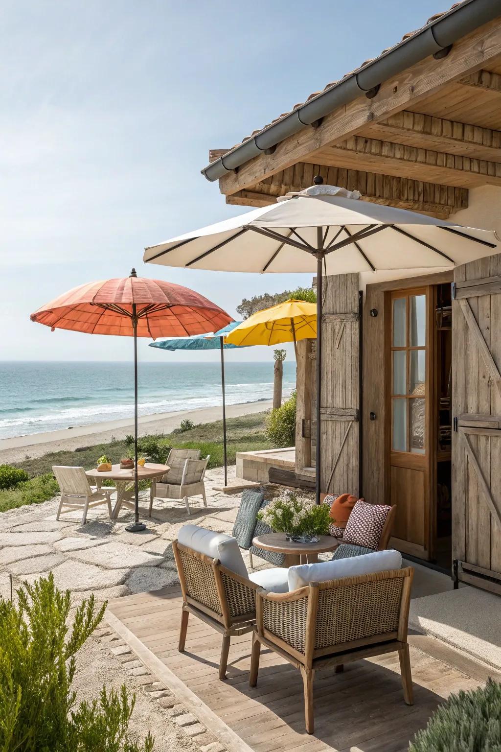 A beach house patio boasting stylish umbrellas for shade and elegance.