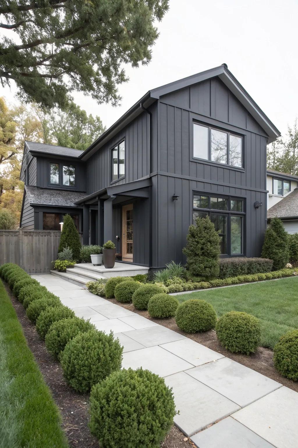 Sophisticated charcoal siding for a sleek and modern look.