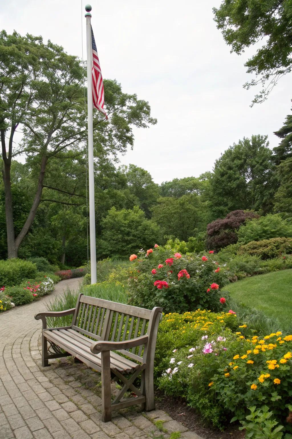 A bench invites peaceful reflection around the flagpole.
