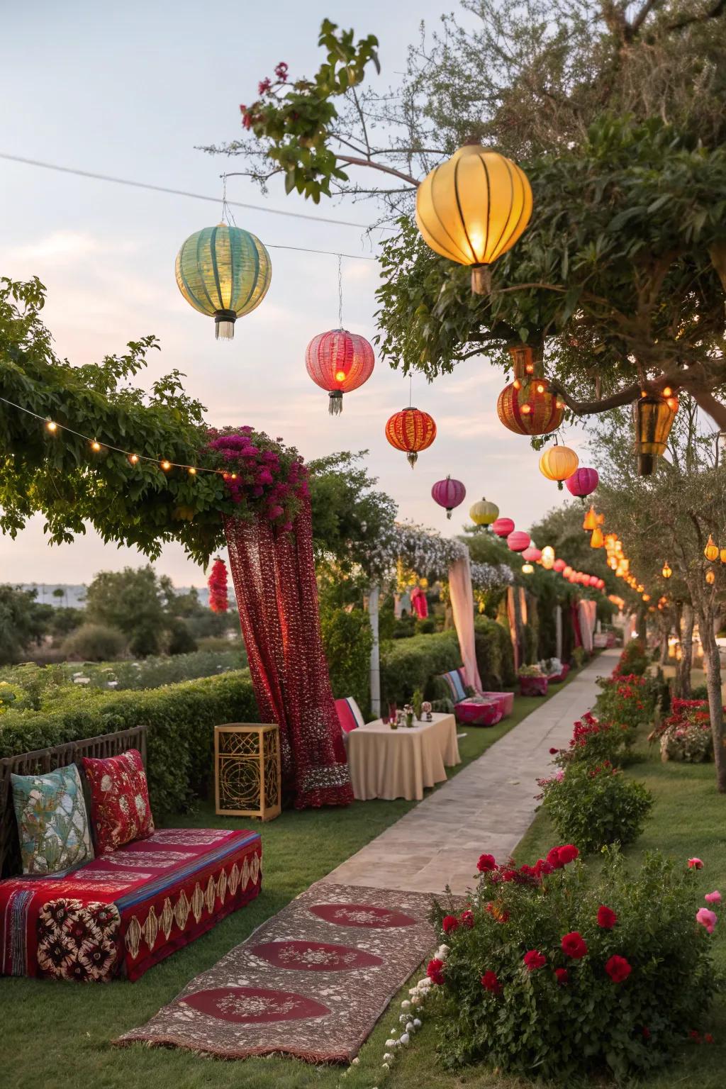 A festive garden adorned with bright lanterns and textiles.