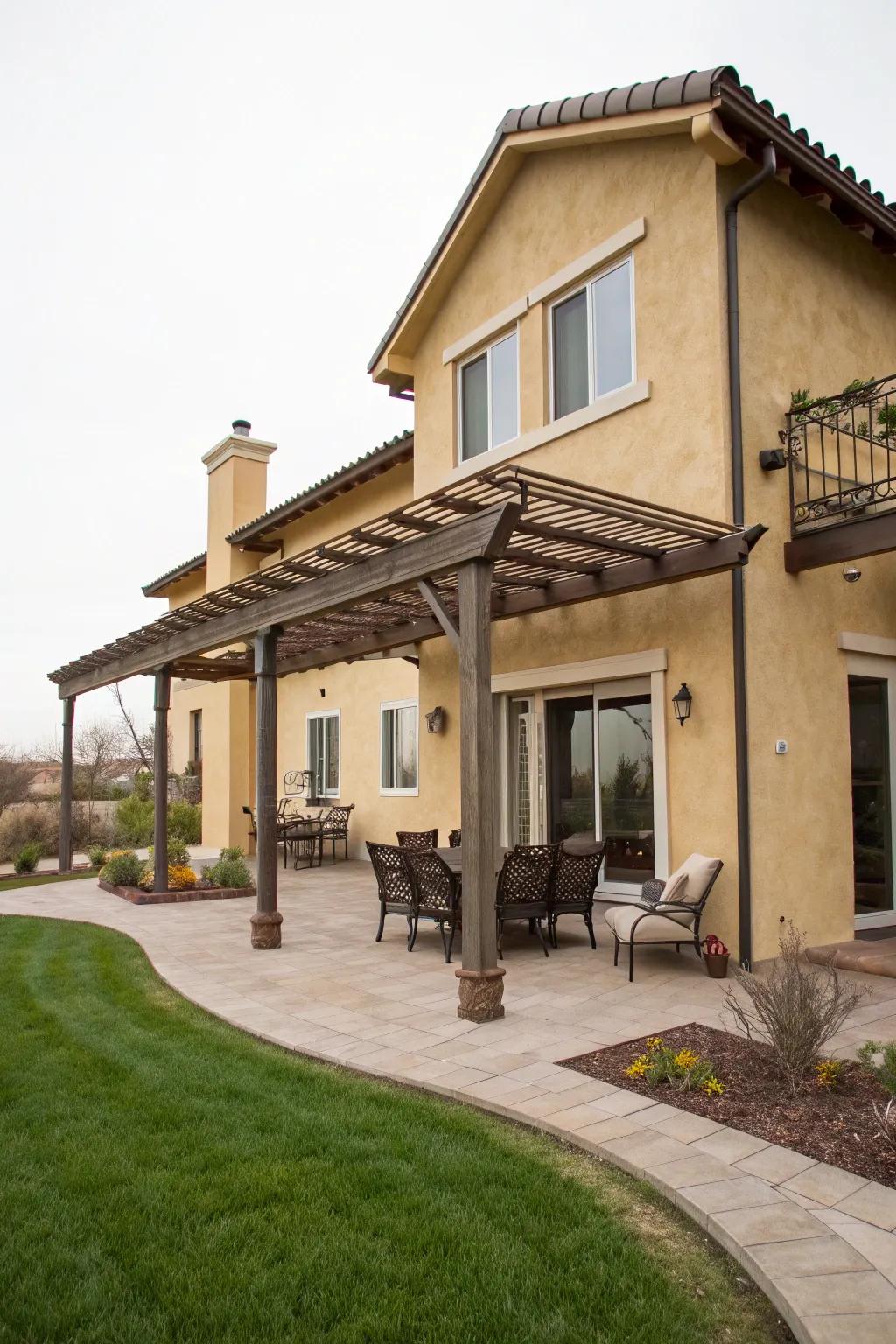 Stucco house with a welcoming outdoor living area.