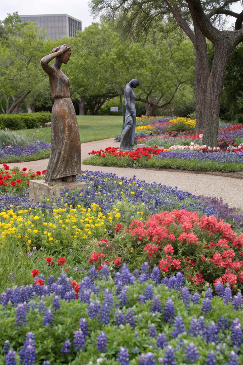 Sculptures add a touch of art to this colorful garden.