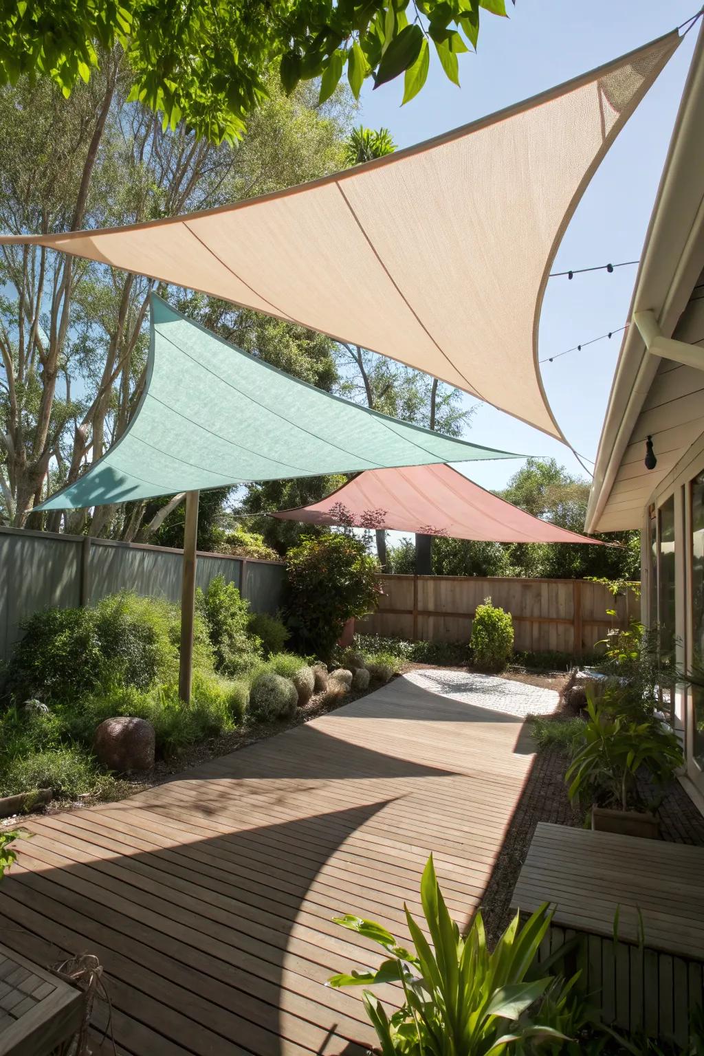 Overlapping sail shades providing an artistic and functional canopy.