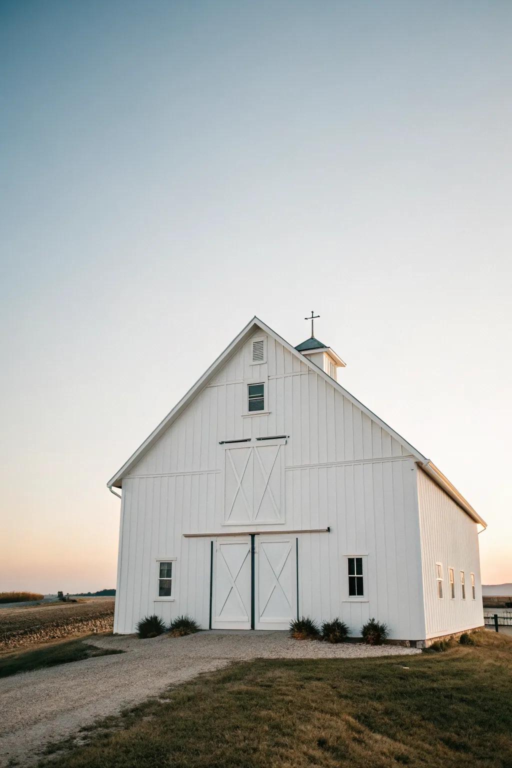 An alpine white barn with a minimalist and crisp appearance.