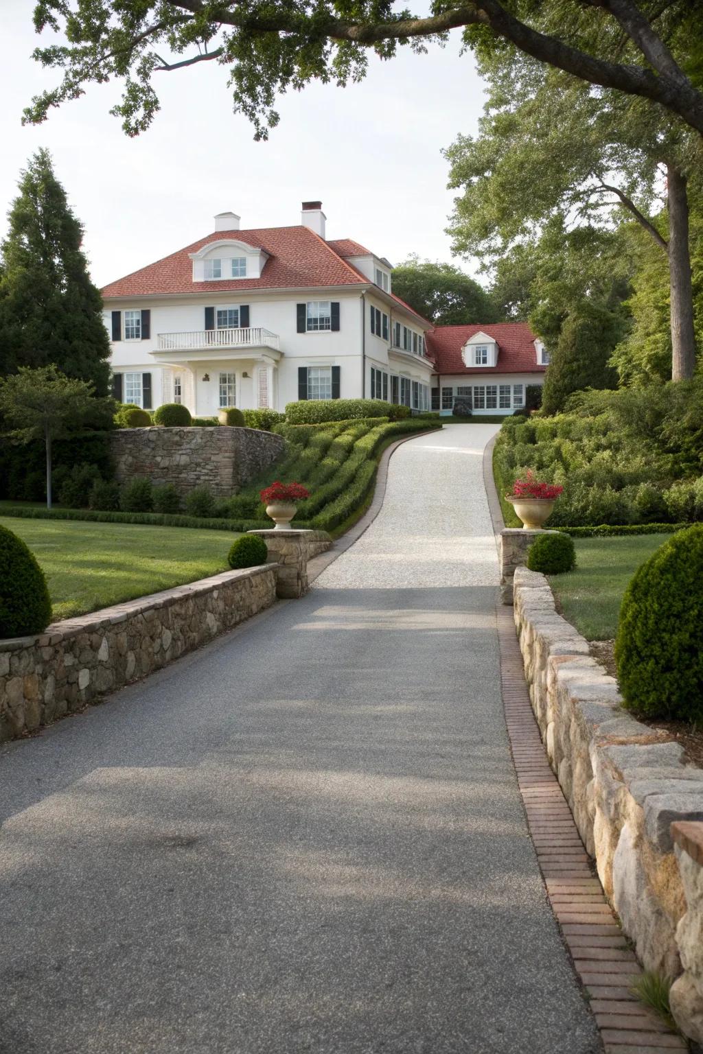 Stone borders add elegance and definition to driveway designs.