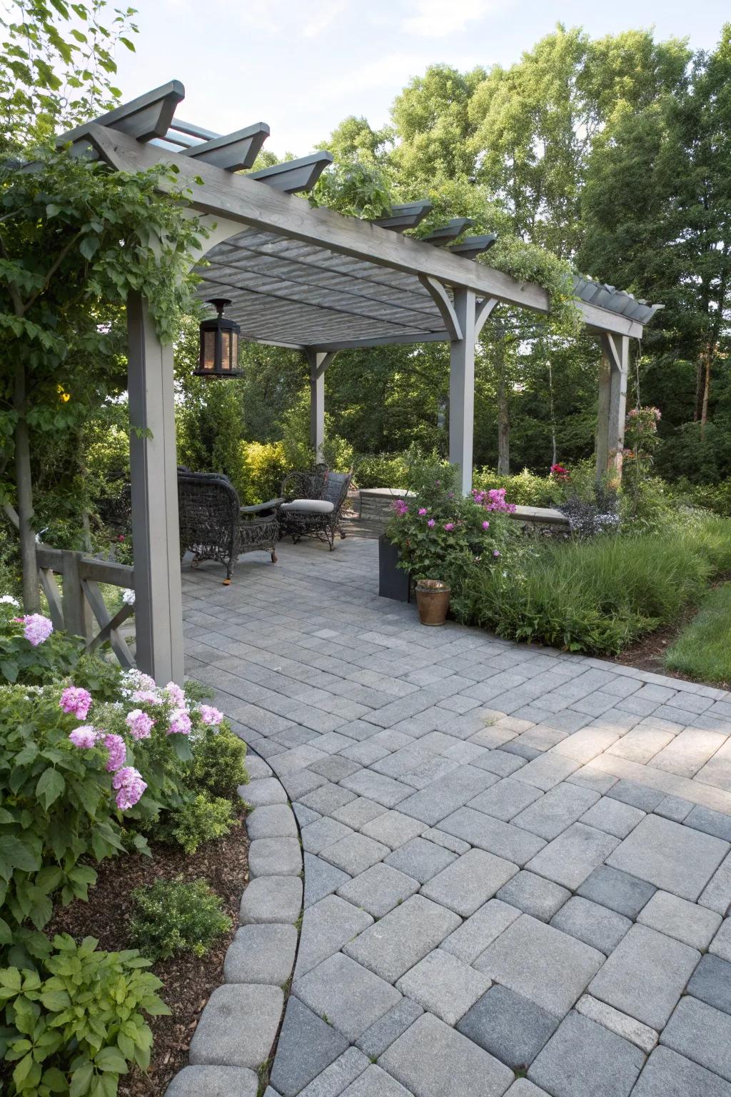 An enclosed pergola offers shade and comfort on a gray paver patio.