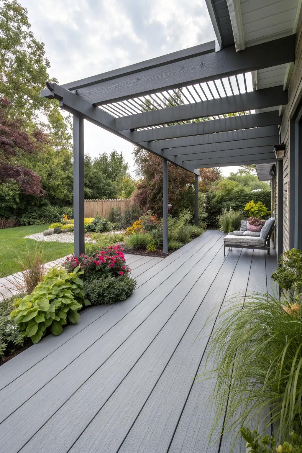 A modern pergola on a grey deck, offering shade and elegance.