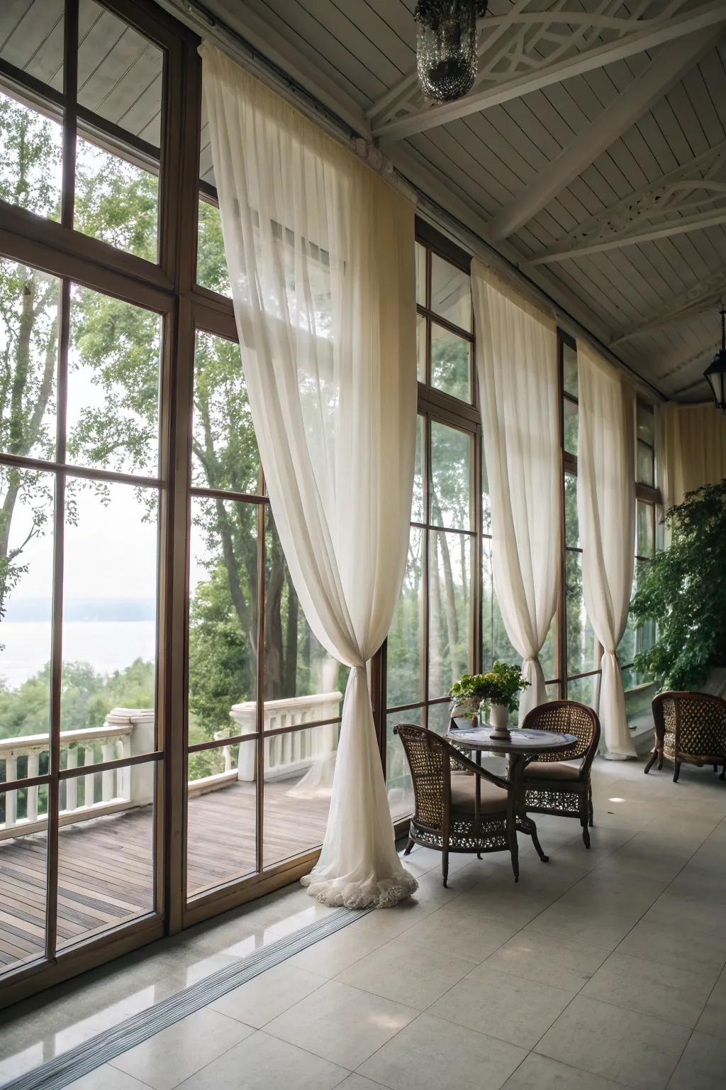Sheer curtains let natural light fill your porch with warmth.