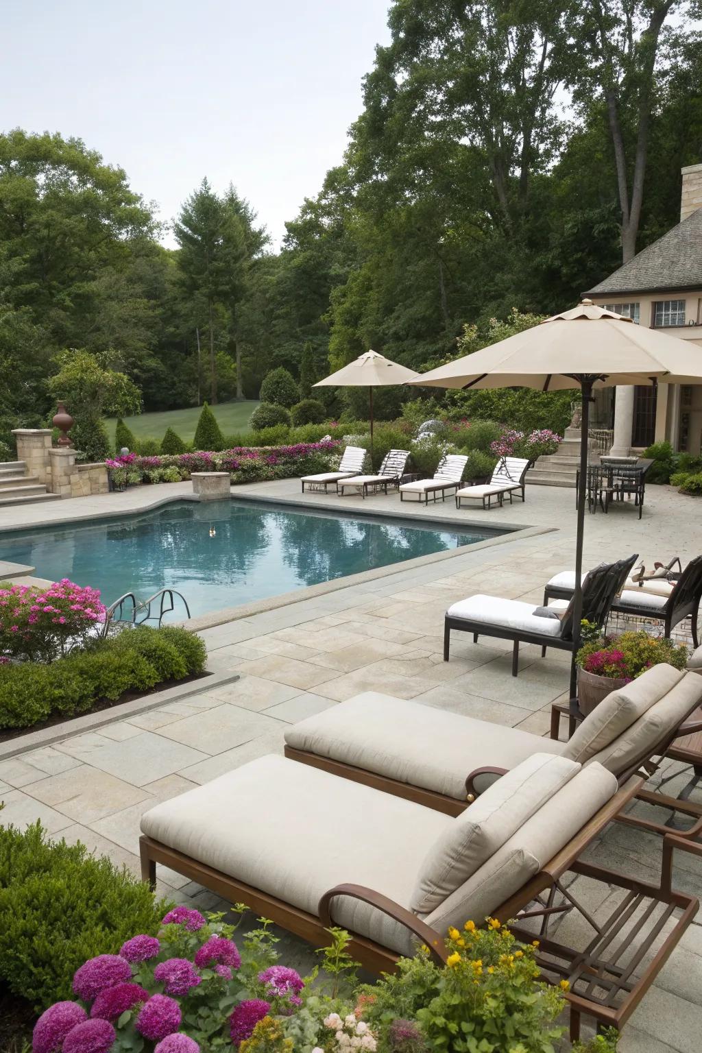 Relax in style with a cozy poolside lounging area.