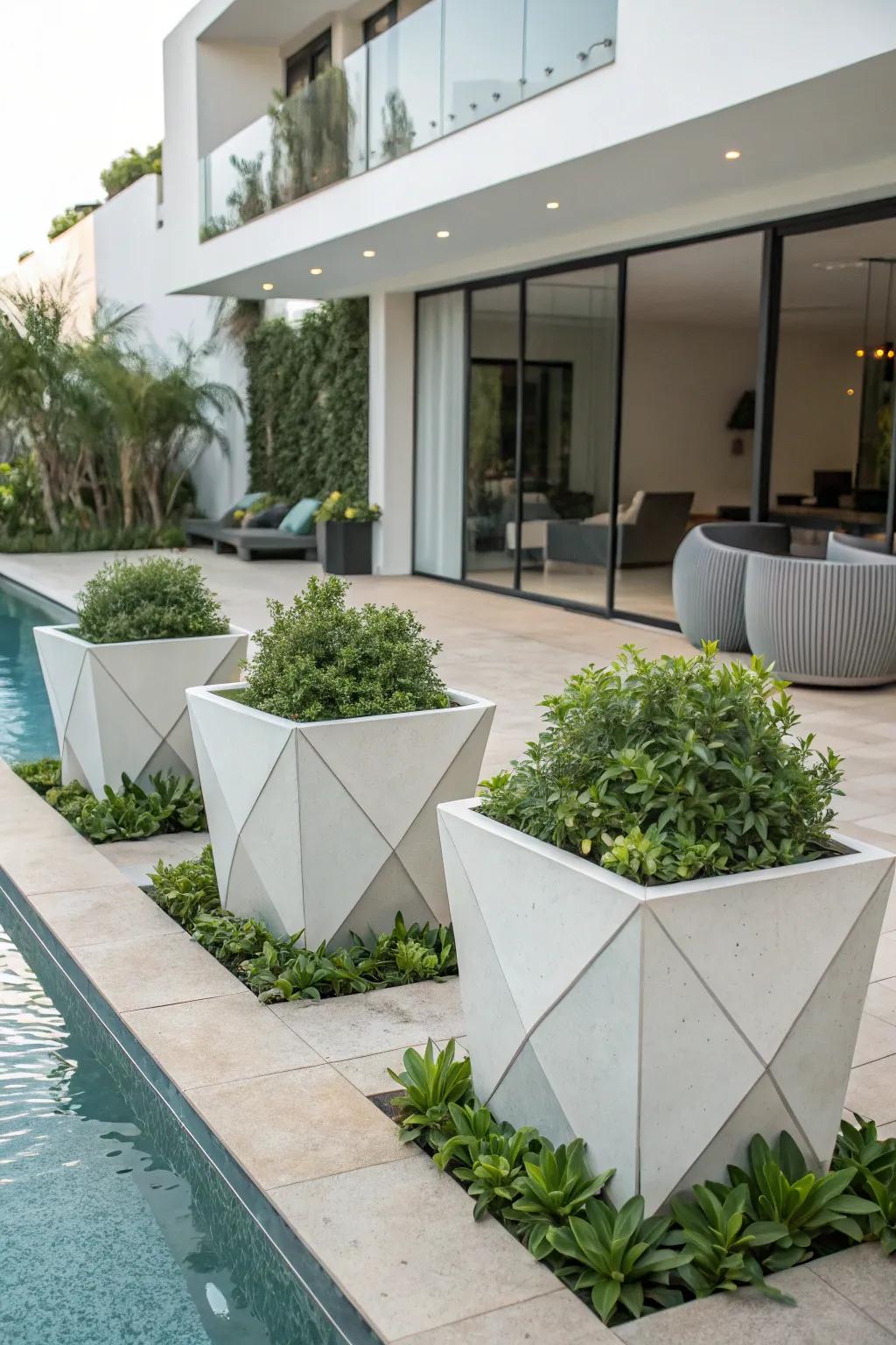 Architectural planters bring a touch of nature to your poolside.
