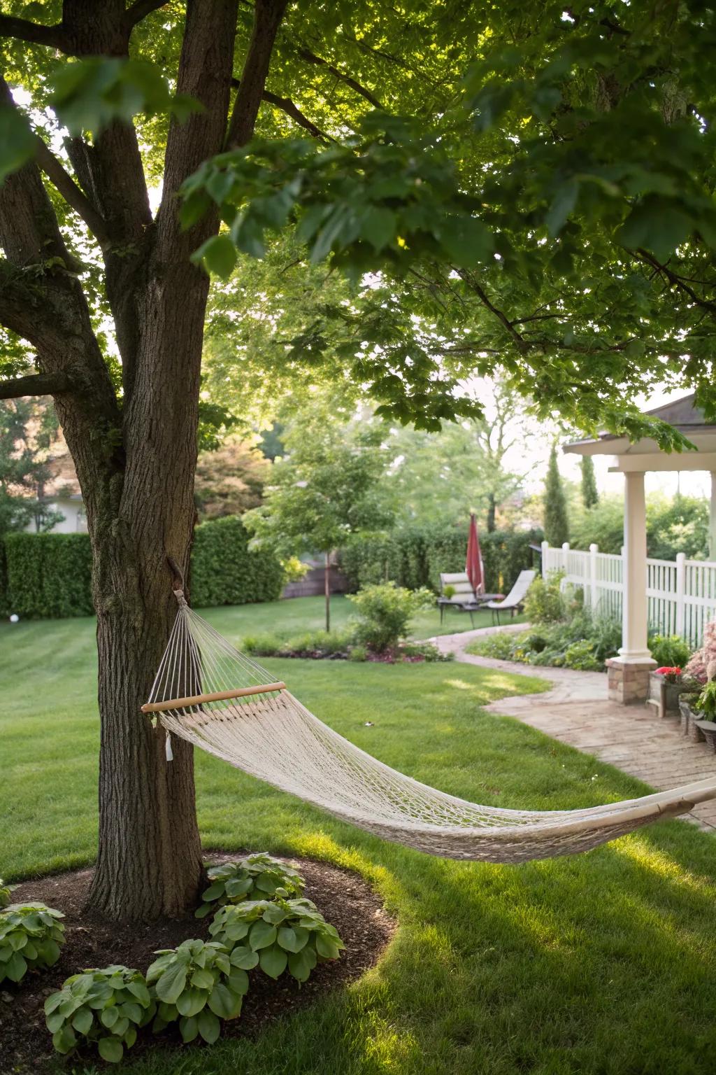 A cozy hammock set up for ultimate backyard relaxation.