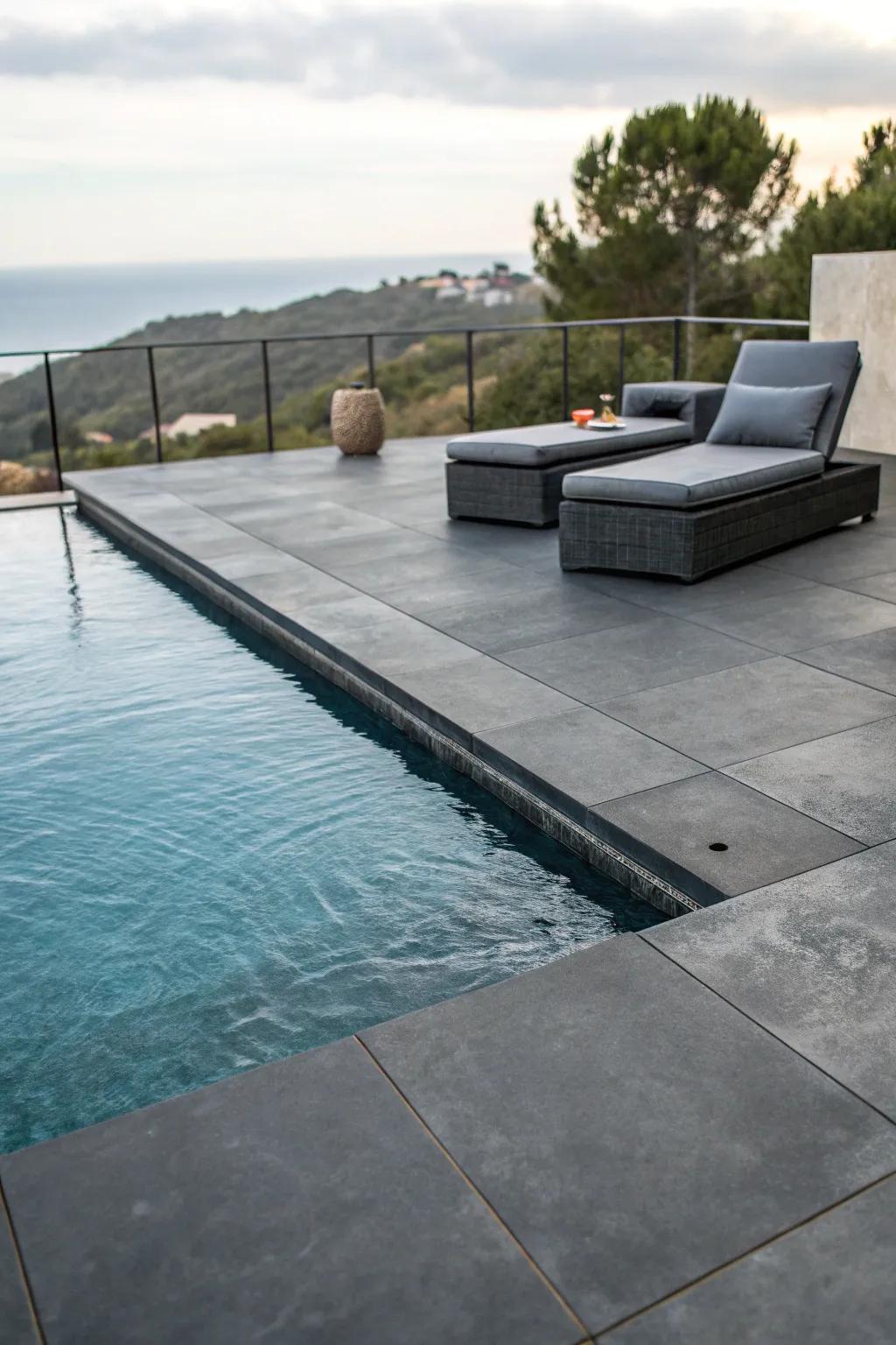 Charcoal concrete adds a chic, modern edge to pool decks.